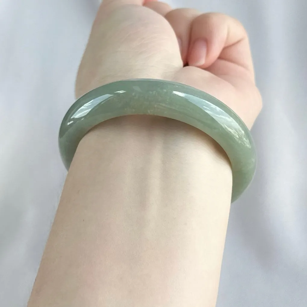 101157 57.5mm Olive Green Furong Base Jadeite Bangle