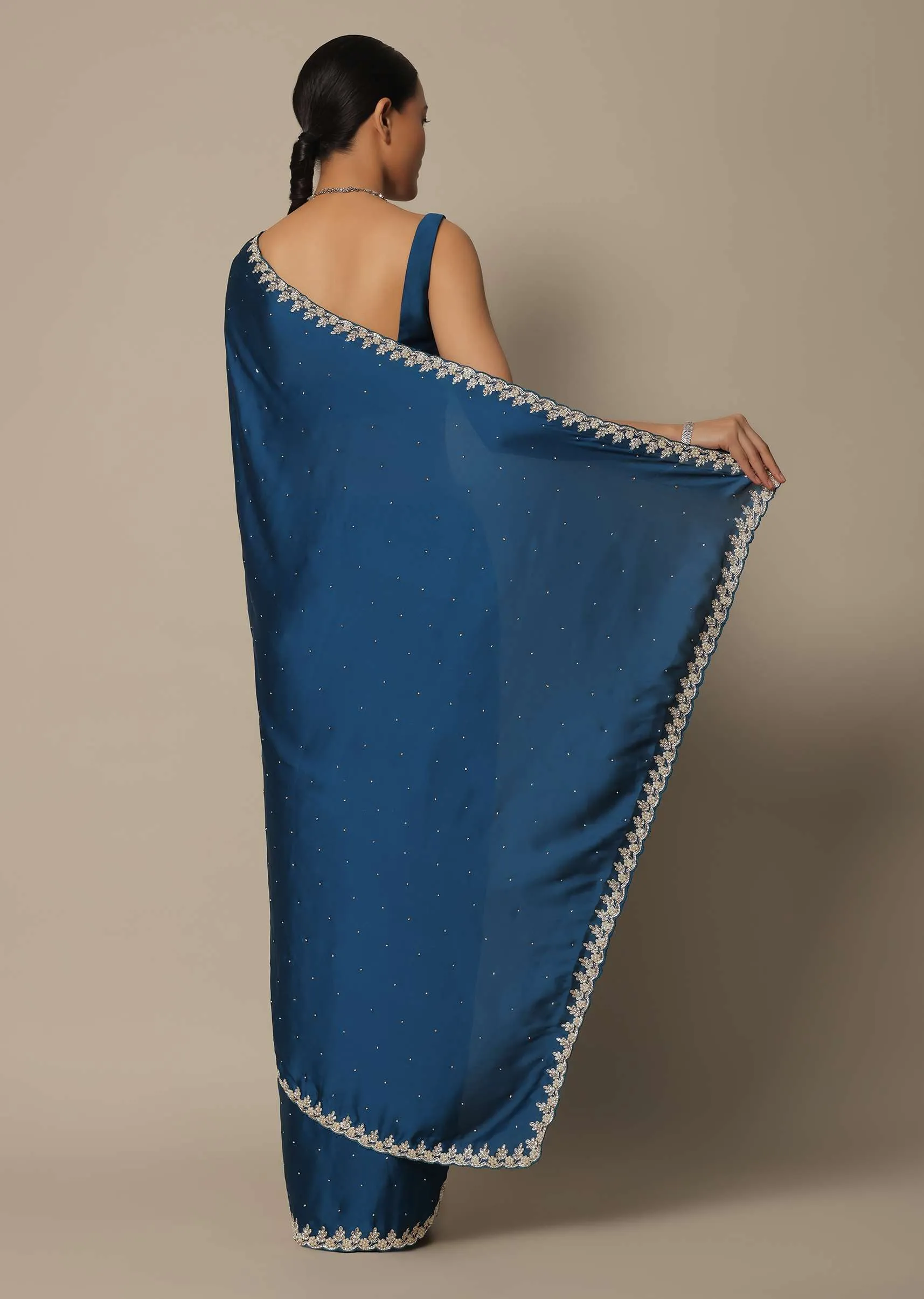 Blue Satin Saree With Stone Studded Border And Unstitched Blouse Piece